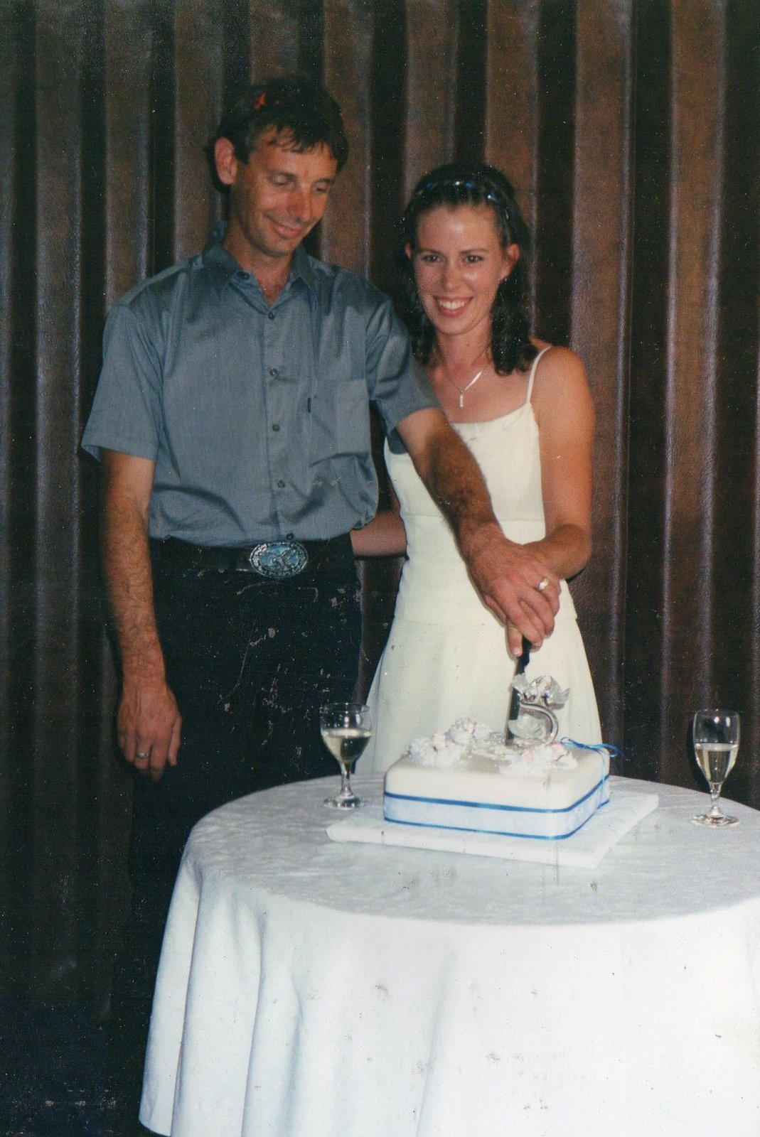13 Paul & Hannah Boyd cutting the cake at their wedding.jpg