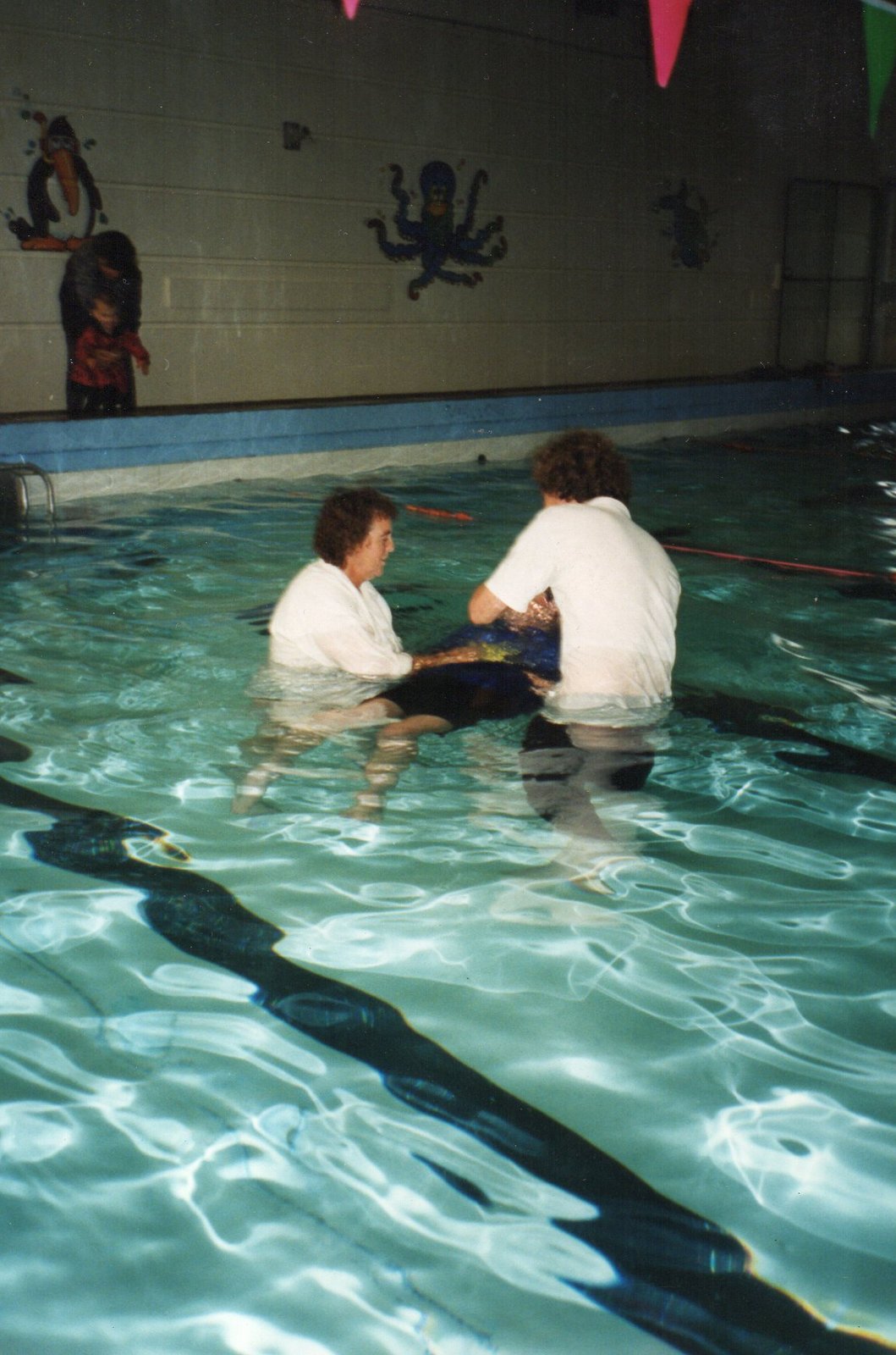 15 Vicki & Christopher Wright, Peter Vandenberg at a baptism.jpg
