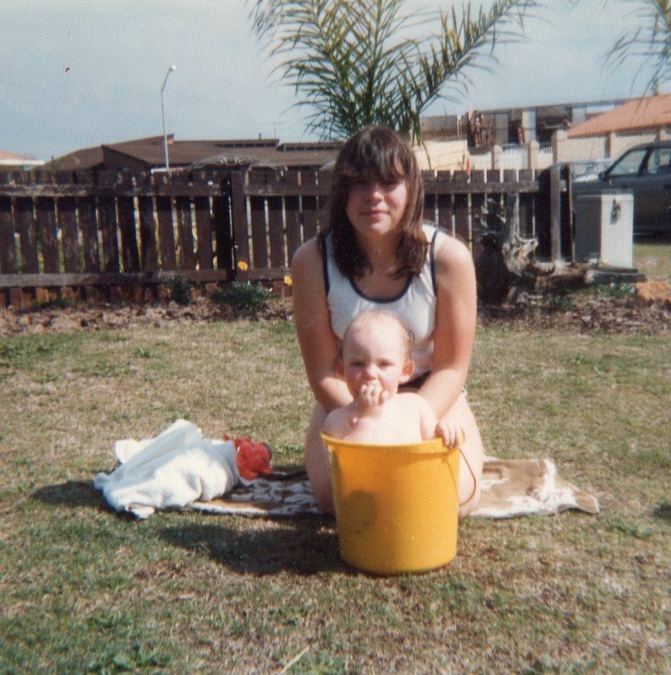09 Carissa Hull washing Christopher Wright in bucket at Surfers 